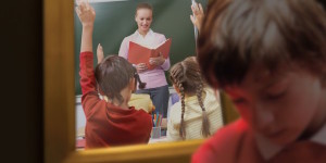 Boy secluded from classroom