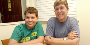 Mother and son at kitchen table