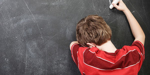 kid at chalkboard