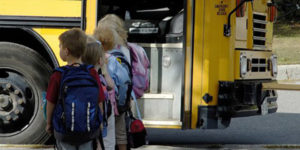 kids walking on school bus