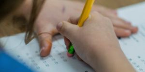 child erasing a test