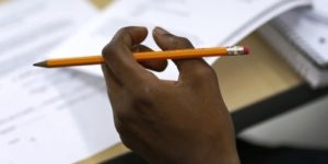 hand holding a pencil