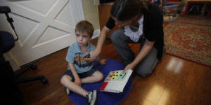 child with autism receiving ABA therapy