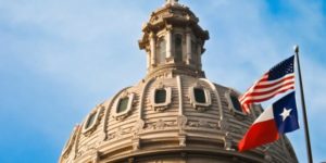 texas flag and building