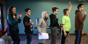 group of teens with ASD at improv class