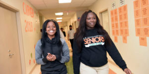 two smiling students