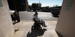 young person in an electronic wheelchair