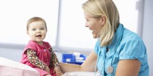 female doctor with a baby